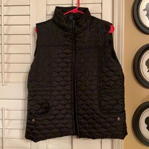 New Directions black vest.